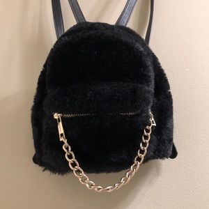 Forever 21 faux leather furry backpack